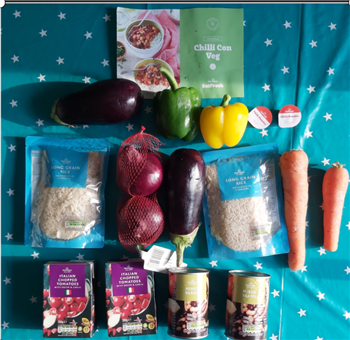 Food parcel delivered with fresh ingredients for a vegetarian chilli